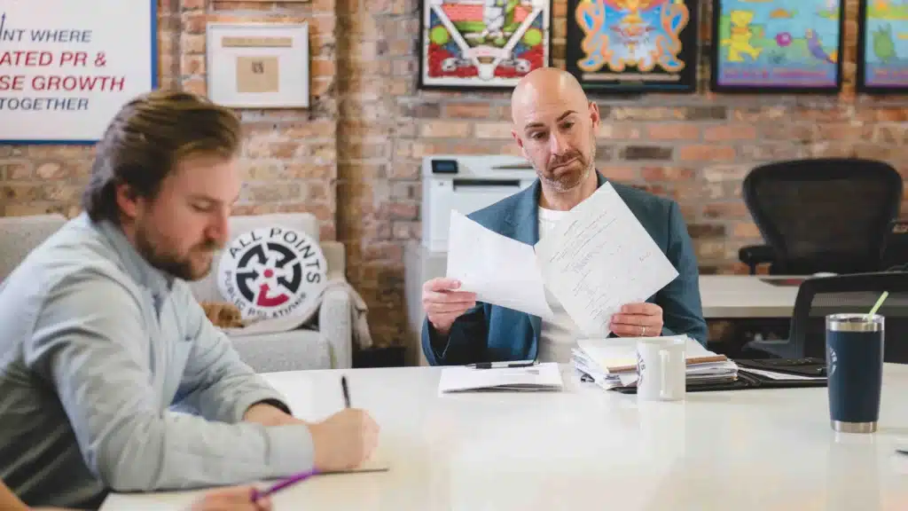 Jamie reviewing meeting notes